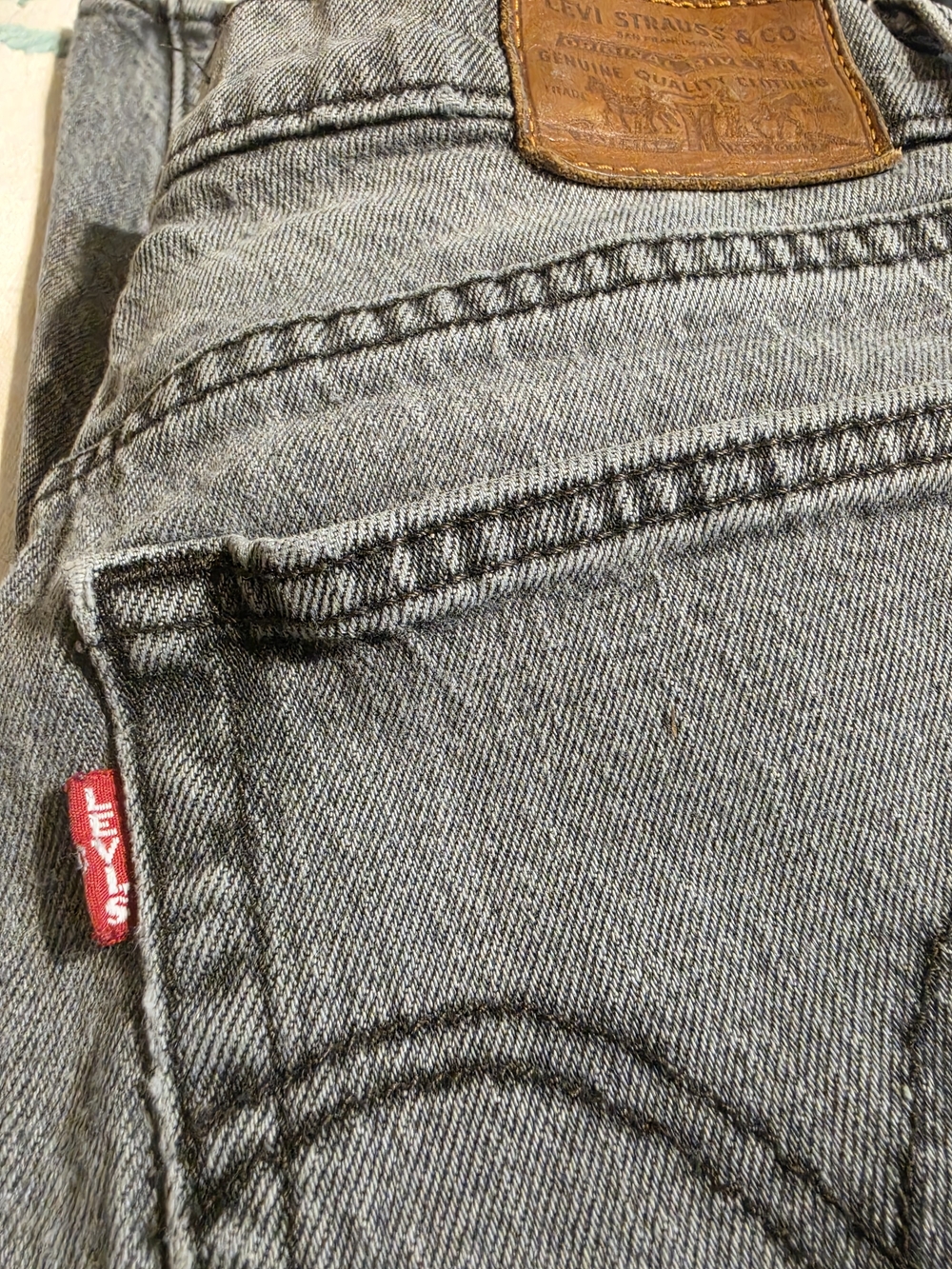 Levi’s Premium Wedgie Fit Jeans in a washed gray denim Big E red Tab